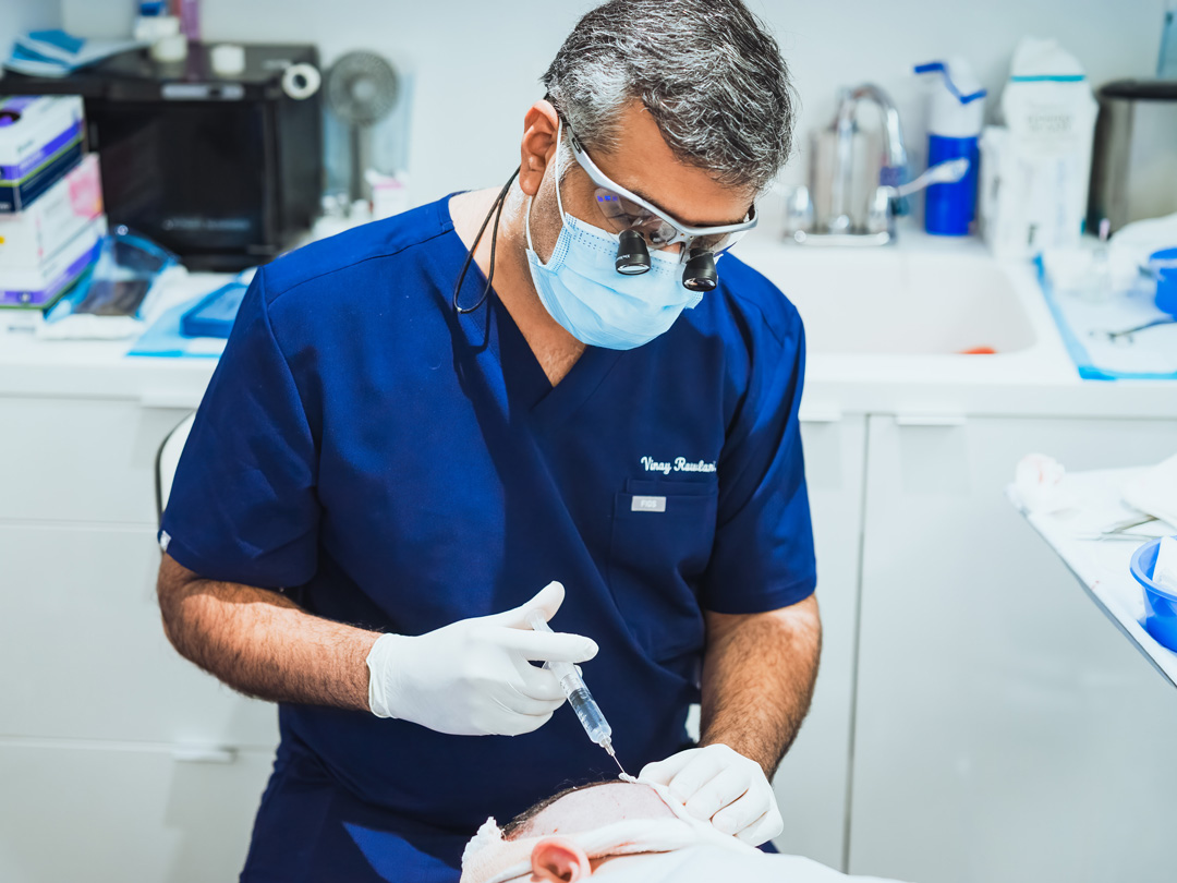 vinay-injecting-back-of-head